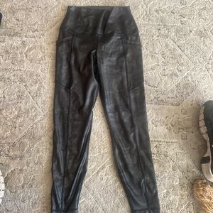 Velocity black athletic leggings size S. 
Body: 
83% polyester
17% spandex